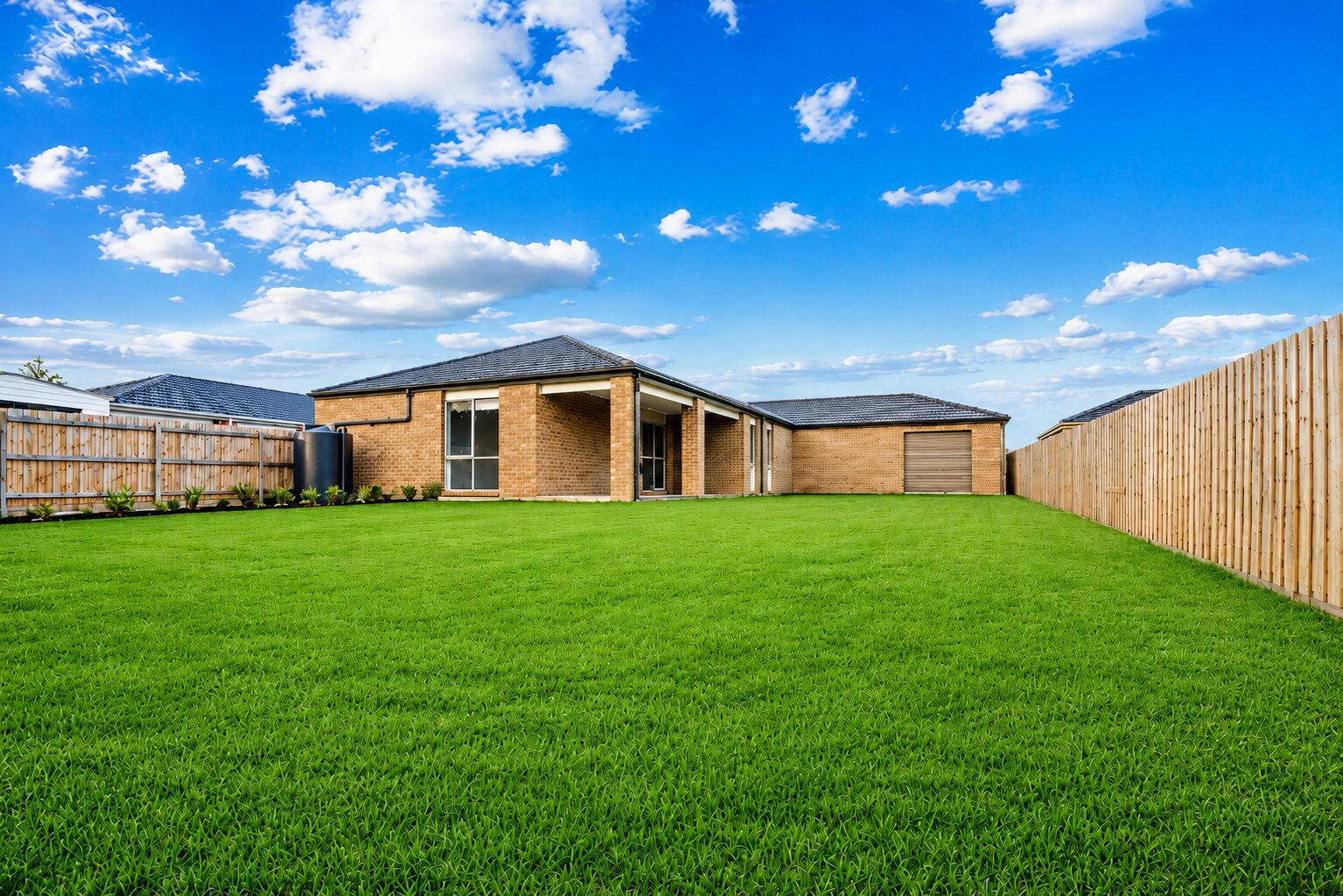 Large backyard and rear home exterior
